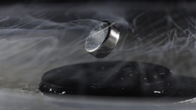 A magnet levitating above a supercooled superconductor thanks to the Meissner Effect. Credits: University of Rochester/J.A. Fenster.